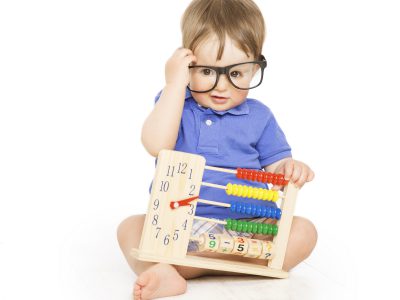 Boy child with abacus clock in glasses counting smart little kid study lesson education concept